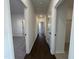 Hallway featuring views into adjoining rooms at 4301 Darius Lane # 28, Fuquay Varina, NC 27526