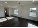 Bright, open floor plan living room with hardwood floors and large windows at 4301 Darius Lane # 28, Fuquay Varina, NC 27526