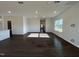 Spacious living room showcasing hardwood floors and recessed lighting at 4301 Darius Lane # 28, Fuquay Varina, NC 27526