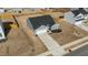 An aerial view of a single-Gathering home displaying the roof, driveway, and surrounding neighborhood at 45 Florentine Ct, Angier, NC 27501