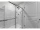 Contemporary bathroom with glass enclosed shower, neutral walls, and tile flooring at 45 Florentine Ct, Angier, NC 27501