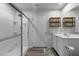 Clean bathroom featuring a glass shower, neutral walls, and functional vanity at 45 Florentine Ct, Angier, NC 27501