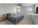 Serene bedroom featuring soft blue bedding, wood accents and tranquil views at 45 Florentine Ct, Angier, NC 27501