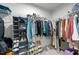 Walk-in closet with ample storage space and organization for clothing and accessories at 45 Florentine Ct, Angier, NC 27501
