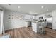 Bright and airy kitchen with stainless steel appliances, barstool seating and granite countertops at 45 Florentine Ct, Angier, NC 27501