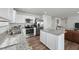 Modern kitchen features granite countertops, stainless steel appliances, and a stylish center island at 45 Florentine Ct, Angier, NC 27501