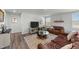 Cozy living room with a large rug and warm furniture provides a comfortable space at 45 Florentine Ct, Angier, NC 27501