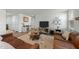Inviting living room with stylish furniture, decor, and hardwood floors at 45 Florentine Ct, Angier, NC 27501