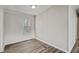 Bright bedroom with a large window for natural light, neutral walls and wood-look floors at 453 Deer Vw, Sanford, NC 27332
