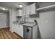 Contemporary kitchen featuring granite countertops, stainless steel dishwasher and ample storage at 453 Deer Vw, Sanford, NC 27332