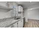 Beautiful kitchen featuring granite counters, stainless steel appliances, and ample natural light at 453 Deer Vw, Sanford, NC 27332