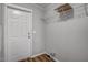 Cozy mud room featuring a door and wire shelving for organization and storage at 453 Deer Vw, Sanford, NC 27332