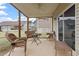 Covered patio area with comfortable seating, perfect for relaxing outdoors at 47 Highmeadow Ln, Clayton, NC 27520