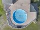 Aerial view of a backyard featuring a wooden deck, in-ground pool, and wooden gazebo at 4709 Wyndchase Ct, Fuquay Varina, NC 27526