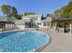 Back of house featuring an in-ground pool, wooden deck, screened in porch and outdoor bar area at 4709 Wyndchase Ct, Fuquay Varina, NC 27526