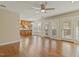 Bright living room with hardwood floors, natural light, and views of the open concept kitchen at 4709 Wyndchase Ct, Fuquay Varina, NC 27526