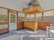 Cozy sunroom with a bamboo bar, tongue and groove ceiling, and lots of natural light at 4709 Wyndchase Ct, Fuquay Varina, NC 27526