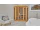 Bright bathroom boasts a sauna, marble floors, large tub, and natural light at 4800 Salem Ridge Rd, Holly Springs, NC 27540