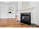 Cozy fireplace with hardwood floors at 5117 Singing Wind Dr, Raleigh, NC 27612