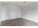 Bedroom featuring two closets, white trim and neutral wall paint at 600 Audubon Lake Dr # 5A32, Durham, NC 27713
