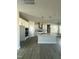 Bright kitchen features a center island, stainless hood, and modern appliances at 622 Ravensworth Dr, Garner, NC 27529