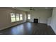 Spacious living room features a fireplace, recessed lighting, and large windows at 622 Ravensworth Dr, Garner, NC 27529