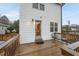 Attached wooden back deck is conveniently accessed from the home with a backyard view at 628 Bragg St, Raleigh, NC 27610