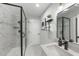 Modern bathroom with glass-enclosed shower, sleek vanity, and stylish fixtures at 628 Bragg St, Raleigh, NC 27610