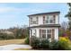 Charming two-story home with a welcoming entrance and well-maintained landscaping at 628 Bragg St, Raleigh, NC 27610