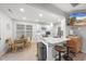 Bright, modern kitchen with a breakfast bar, and a connected dining area at 628 Bragg St, Raleigh, NC 27610