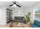 Cozy living room with modern furniture, a statement plant, and stylish decor at 628 Bragg St, Raleigh, NC 27610