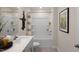 Bathroom with a shower-tub combo, a single vanity, and decorative accents at 86 Saddle Mare St, Clayton, NC 27520