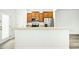 Kitchen includes granite countertops, wood cabinets, and stainless steel appliances at 94 E Grove Point Dr, Clayton, NC 27527