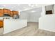 Bright kitchen features wood cabinets, stainless steel appliances, and an open layout at 94 E Grove Point Dr, Clayton, NC 27527