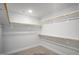 Spacious walk-in closet with ample shelving and storage, designed for organization at 35 Merle Dr, Wendell, NC 27591