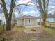 Spacious backyard with a circular firepit area, providing an inviting space for outdoor activities and relaxation at 1012 Holloway St, Durham, NC 27701