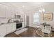 Modern kitchen featuring stainless steel appliances and an adjacent eating nook at 1012 Holloway St, Durham, NC 27701