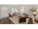 Cozy living room with hardwood floors, natural light, and stylish furniture at 1012 Holloway St, Durham, NC 27701