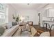 Inviting living room flows into the kitchen and dining area, perfect for entertaining at 1012 Holloway St, Durham, NC 27701