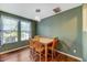 Comfortable dining area with wood table and chairs near natural light at 1019 Grand Ridge Dr, Rolesville, NC 27571