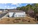 Spacious backyard and manicured landscaping surround a modern two-story home at 1107 Depot Dr, Durham, NC 27703