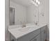 Bright bathroom features double sink vanity with modern faucets, large mirror, and updated fixtures at 1107 Depot Dr, Durham, NC 27703