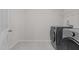 Well-equipped laundry room with modern washer and dryer units at 1107 Depot Dr, Durham, NC 27703