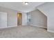 Spacious bedroom with neutral carpet and a light gray paint, as well as natural light from a window at 1109 Hemby Ridge Ln, Morrisville, NC 27560