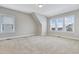 Bright bedroom with multiple windows offering ample natural light and a cozy carpet at 1109 Hemby Ridge Ln, Morrisville, NC 27560