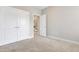 Spacious bedroom with large closets and a hallway entrance at 1109 Hemby Ridge Ln, Morrisville, NC 27560