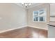 Cozy dining area with wood floors and a window providing natural light at 1109 Hemby Ridge Ln, Morrisville, NC 27560