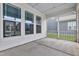 A covered patio provides a serene outdoor space with neutral tones, perfect for relaxation and entertaining at 1109 Hemby Ridge Ln, Morrisville, NC 27560