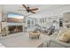 Open living room area features a fireplace, views to the kitchen, and lots of natural light at 14115 Allison Dr, Raleigh, NC 27615