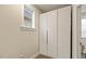 Closet featuring a wall of white cabinet doors and neutral-colored walls at 1501 Millrock Trl, Wendell, NC 27591